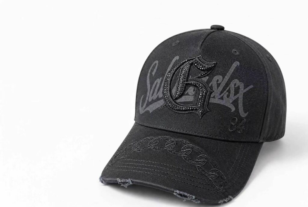 cap adopts a distressed frayed finish